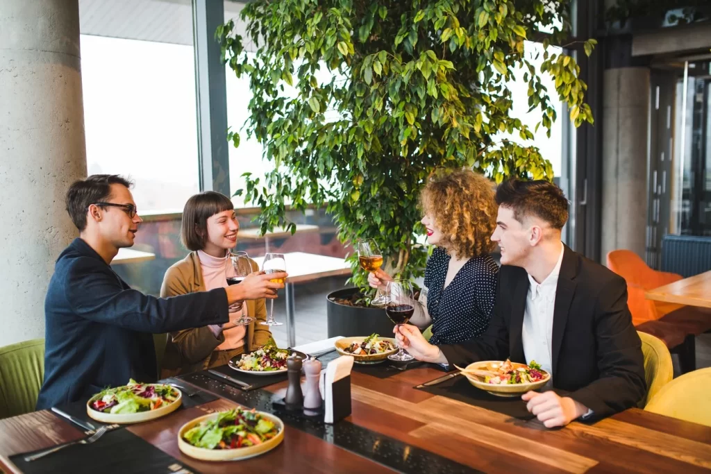 group-friends-eating-restaurant_23-2148006582