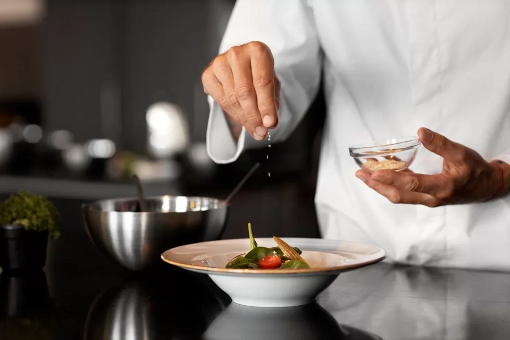 professional-chef-preparing-food-kitchen_23-2149727977